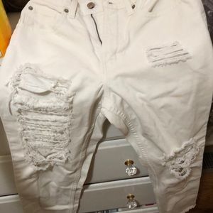 White customized ripped jeans fits like a 2
